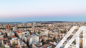 Stadtansicht von Belgrad: Luftaufnahme der Gemeinde Palilula mit historischen und modernen Wohnhäusern, Donau und und der St. Markus Kirche. Über das Bild wurde ein weißes Austria A gelegt.